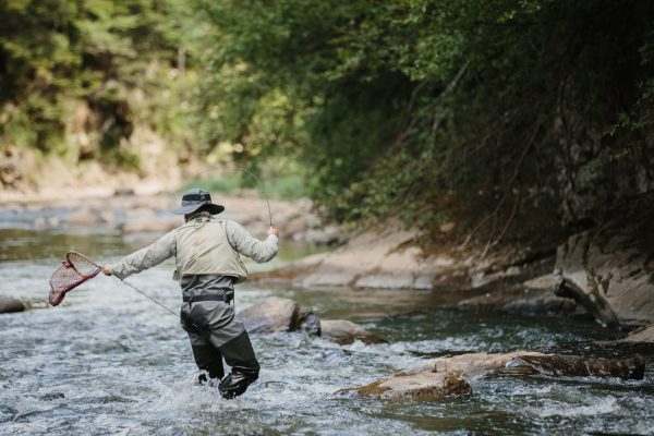 HappyGrounds-Willowemoc-Roscoe-fisherman-catching-trout
