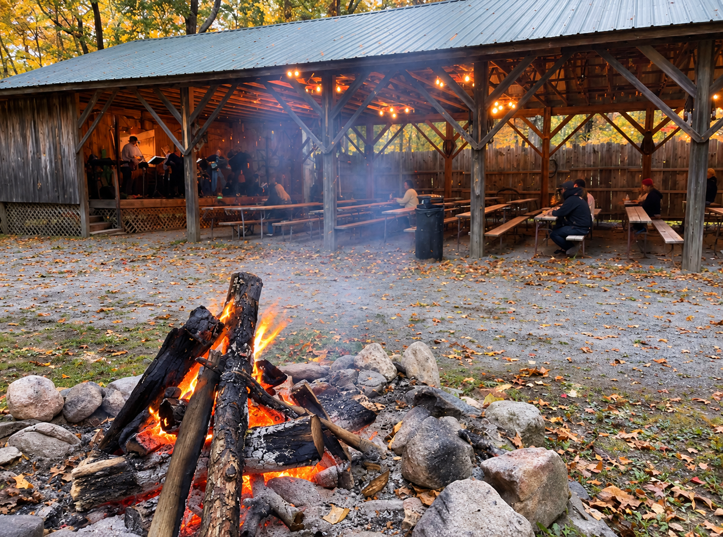 Campfire beneath the autumn pavilion